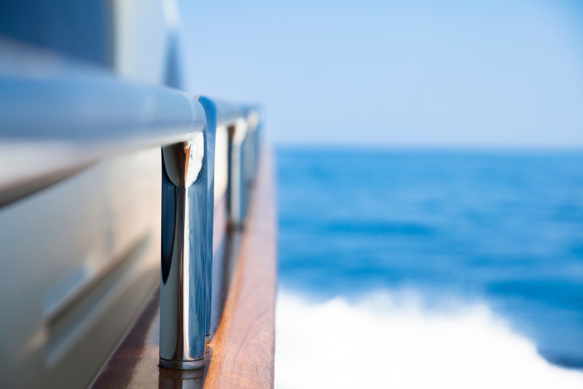 Yacht Sailing. High speed. Hand Rails. Close-up.  Sea. Waves.